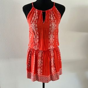 Orange floral and geometric patterned dress